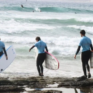 Clase de Surf Grupal al Amanecer o Atardecer (Arona, Santa Cruz de Tenerife)
