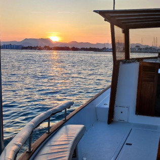 Excursión en Barco a Es Coll Baix con Aperitivo, Snorkel y Paddle Surf para dos (Alcúdia, Mallorca)