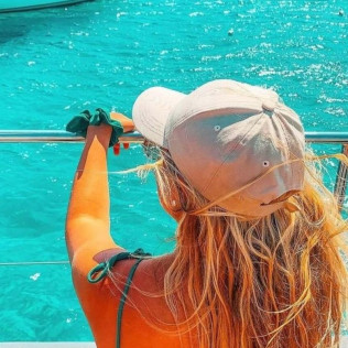 Excursión en Catamarán a Cala Blanca con Moto de Agua, Baño y Comida (Jávea, Alicante)