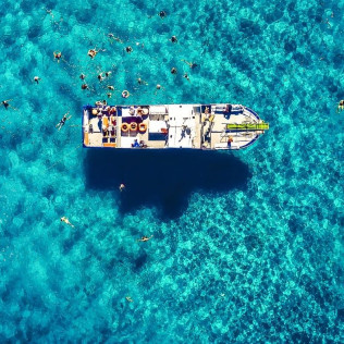 Ibiza Beach Hopper: Excursión en Catamarán a las Playas de Ibiza con Almuerzo, Paddle Surf y Snorkel (Ibiza)