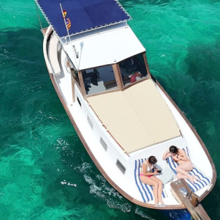 Paseo en Llaüt Tradicional Mallorquín con Aperitivo, Snorkel y Paddle Surf para dos (Alcúdia, Mallorca)