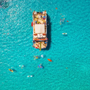 Paseo en Barco por las Calas de Ibiza con Bebidas, Aperitivo, Snorkel y Paddle Surf (Ibiza) 