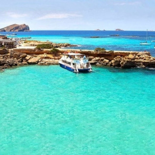 Paseo en Barco por las Calas de Ibiza con Bebidas, Aperitivo, Snorkel y Paddle Surf (Ibiza) 