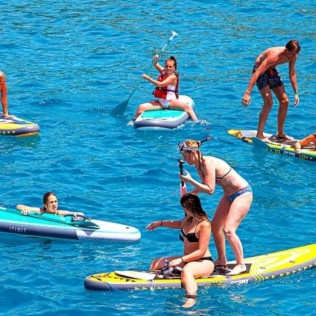 Paseo en Barco por las Calas de Ibiza con Bebidas, Aperitivo, Snorkel y Paddle Surf (Ibiza) 