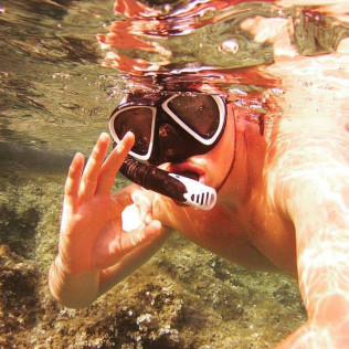 Snorkel Guiado con Monitor y Ruta en Barco por el Norte de Menorca (Puerto de Addaya, Menorca)
