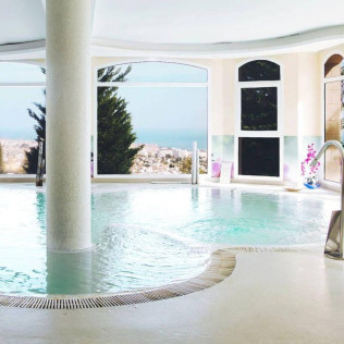 Circuito Spa, Masaje Cervical, Envoltura y Menú para dos en Spa Sensara (Arroyo de la Miel, Málaga)