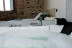 Escapada en Habitación Doble con Jacuzzi y Desayuno en El Esquileo (Buitrago del Lozoya, Madrid)