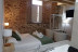 Escapada en Habitación Doble con Jacuzzi y Desayuno en El Esquileo (Buitrago del Lozoya, Madrid)