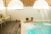 Acceso a piscina termal, Masaje Oriental y Comida o Cena para Parejas en Spa Hospes Puerta de Alcalá 5* (Madrid)